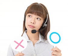 名簿にない名前宛の電話を受けて判断に迷うオペレーター画像